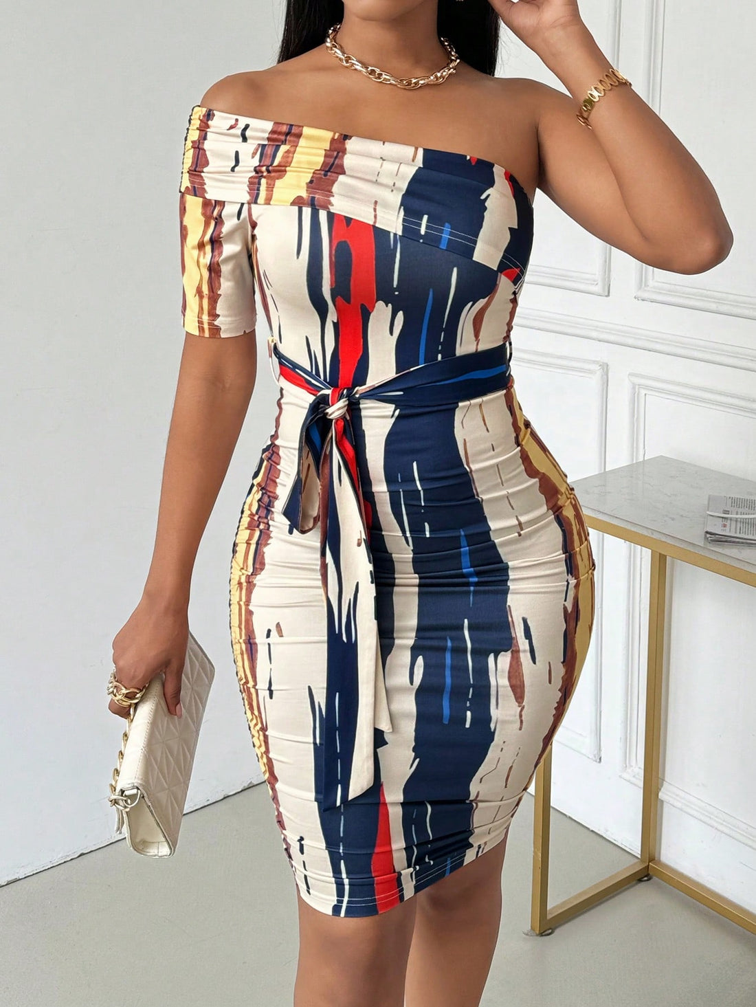 Turn heads this season in our breezy summer midi dress—the perfect blend of chic and effortless. The trendy open-shoulder design keeps things cool and flirty, while the cinched waist belt creates a flattering silhouette that'll have you feeling confident all day long. Whether you're heading to brunch, a garden party, or a casual evening out, this versatile piece transitions seamlessly from day to night. Soft, breathable fabric ensures you stay comfortable even when the heat is on. Your new go-to dress await