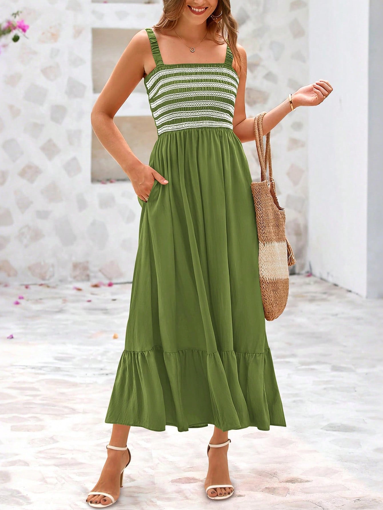 Get ready to turn heads with our Stylish Summer Spaghetti Strap Midi Dress! The flowy high waist design creates a flattering silhouette, while the convenient pockets add a touch of practicality. Perfect for any beach or vacation destination, this dress is a must-have for any fashion-forward woman. Order now and slay all summer long!