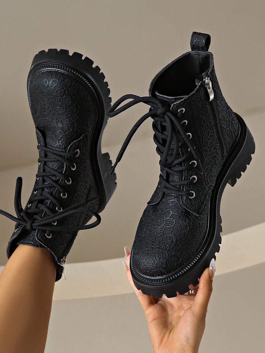 Step out with confidence in these playful yet sturdy women's motorcycle boots. Featuring a thick sole for added comfort and grip, their black and white leather design pairs perfectly with your autumn and winter wardrobe. The classic lace-up style not only keeps your feet snug but adds a touch of edgy flair to every look. Ready to ride or stroll, these boots blend style and function effortlessly.