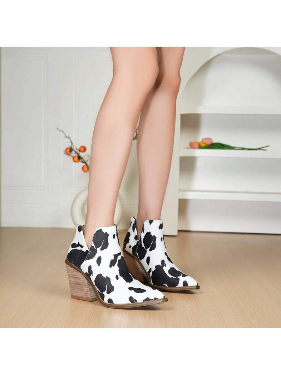 Step into bold style with these women’s western cowboy booties! Featuring a stacked leather heel and a playful V-cut ankle, they slip on easily for a hassle-free fit. Perfect for adding a dash of Western charm to any outfit, these boots blend fashion and comfort effortlessly. Whether you’re headed to a festival or just turning heads downtown, these booties bring a fun, flirty vibe to your wardrobe.