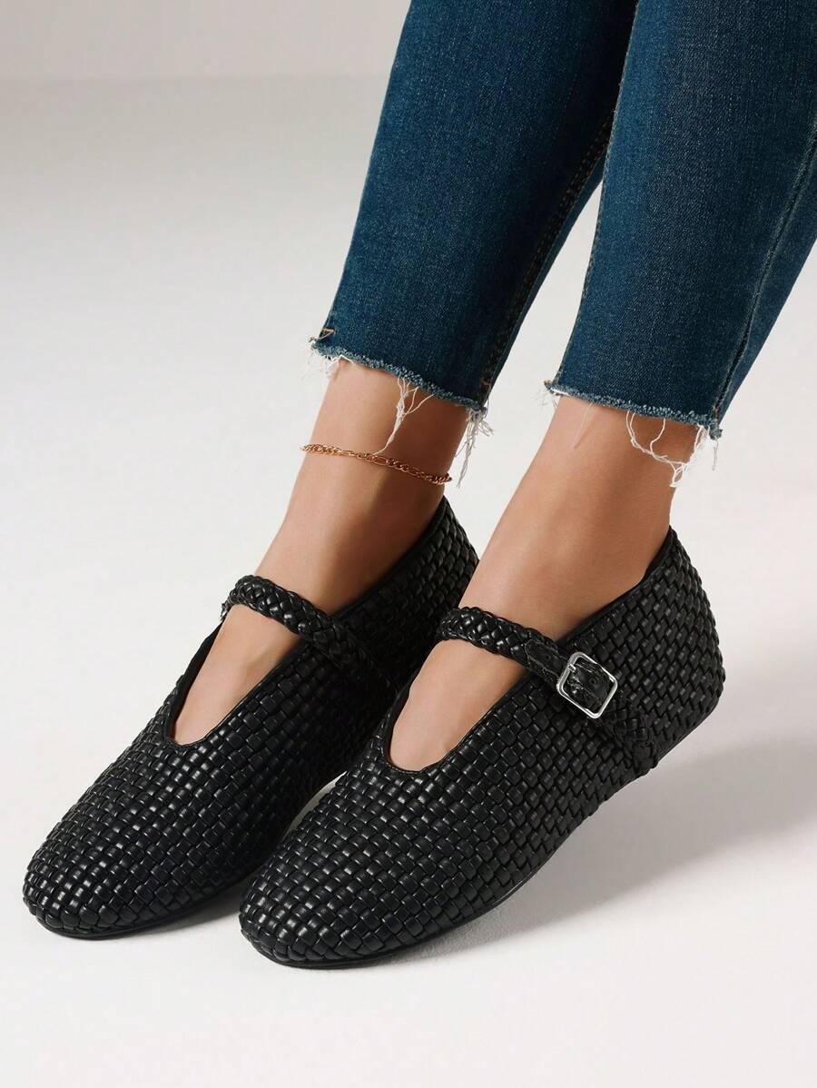 Elevate your everyday footwear with these refined woven ballet flats, designed for the discerning woman who values both style and comfort. The signature buckle strap detail adds a polished Mary Jane aesthetic, while the soft woven upper provides breathable wear throughout the day. Crafted with a cushioned insole and flexible sole, these ballerina-inspired flats transition seamlessly from casual outings to relaxed office settings. The timeless silhouette pairs effortlessly with dresses, jeans, or trousers, m