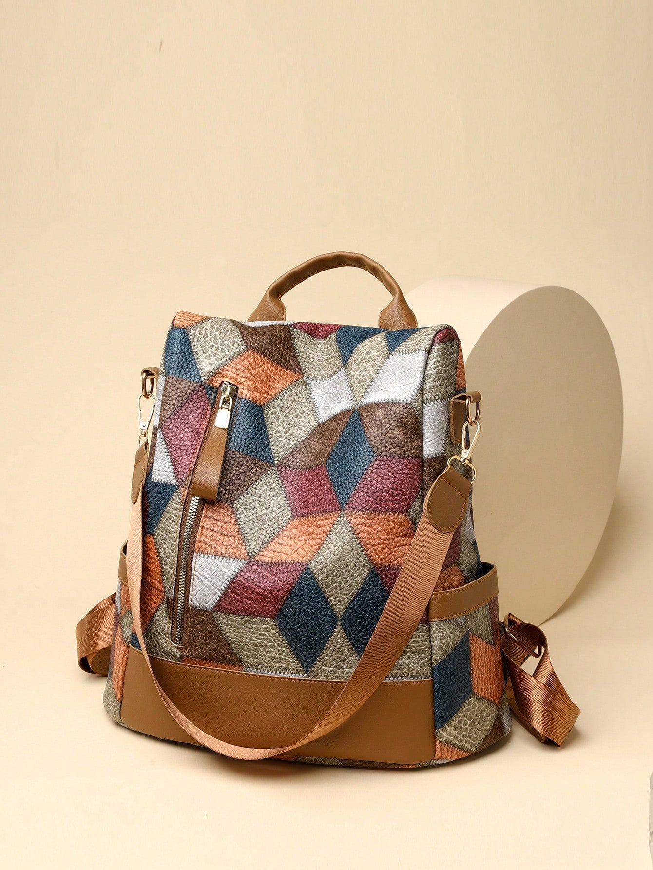 Be stylish and secure with our anti-theft backpack! Featuring a unique color block rhombic check design, this backpack not only looks fashionable but also keeps your belongings safe. With its anti-theft feature, you can enjoy your day without worrying about pickpockets. Perfect for women on the go!