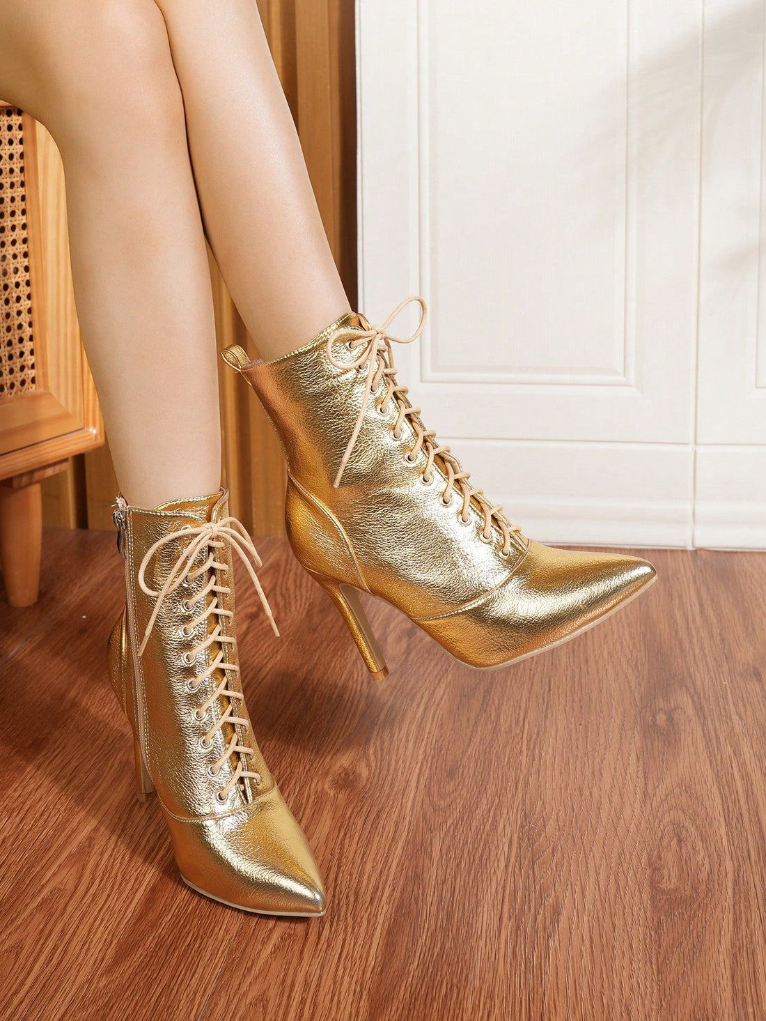 Elevate your style with our Sultry Lace-Up Stiletto Ankle Boots. These versatile boots feature a side-zipper for easy wear and an alluring lace-up design. Experience a boost of confidence with every step in these chic ankle boots.