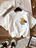 Get ready to turn heads this summer with our vibrant Orange Graffiti Graphic Tee! This playful white t-shirt features a bold, colorful design that pops against its crisp short sleeves and classic round neck. Perfect for sunny days and casual outings, it adds a fun splash of style to any outfit while keeping you cool and comfy. Embrace the season with a tee that’s as lively and bright as your summer adventures!