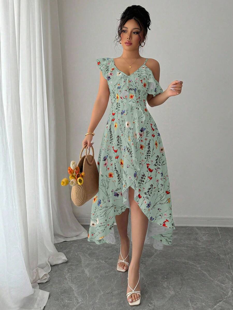 Twirl into summer with this charming asymmetrical ruffle dress, where delicate florals meet effortless elegance. The playful ruffled hem adds movement and personality to your warm-weather wardrobe, while the graceful flower print brings a touch of botanical beauty to every occasion. Perfect for garden parties, casual outings, or whenever you want to feel put-together without trying too hard. Slip it on and let the ruffles do the talking!