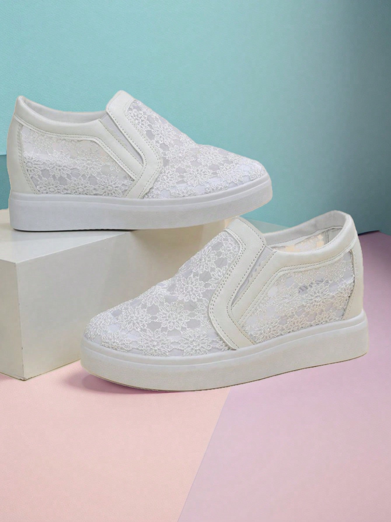 Elevate your style with our newest addition, the Summer Blooms: Floral Embroidery Mesh Casual Platform Sneakers. With their trendy floral embroidery, these sneakers add a touch of elegance to your casual look. The mesh material ensures breathability for those hot summer days, while the platform design provides extra comfort and support. Upgrade your wardrobe with these must-have sneakers.