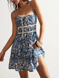 Embrace sunny days in this playful Summer Boho mini dress, featuring a breezy blue and white floral print and an open back design. Perfect for casual vacations, it combines comfort with a flirty vibe, making every moment feel like a carefree getaway.