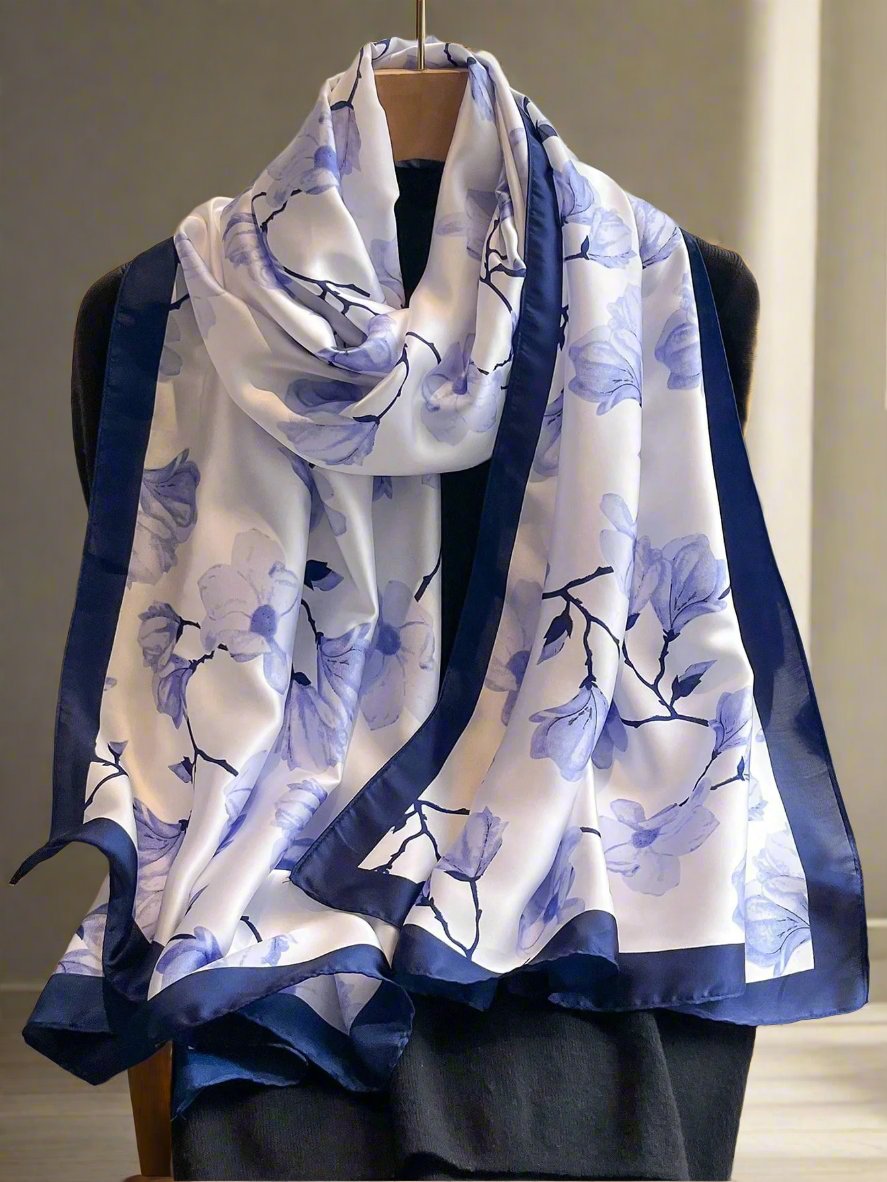 This Floral Printed Silk Scarf is the perfect accessory for any beach holiday. Made with 100% pure silk, it offers a lightweight and luxurious feel, while the vibrant floral print adds a touch of summer to any outfit. A must-have for any fashion-forward woman.