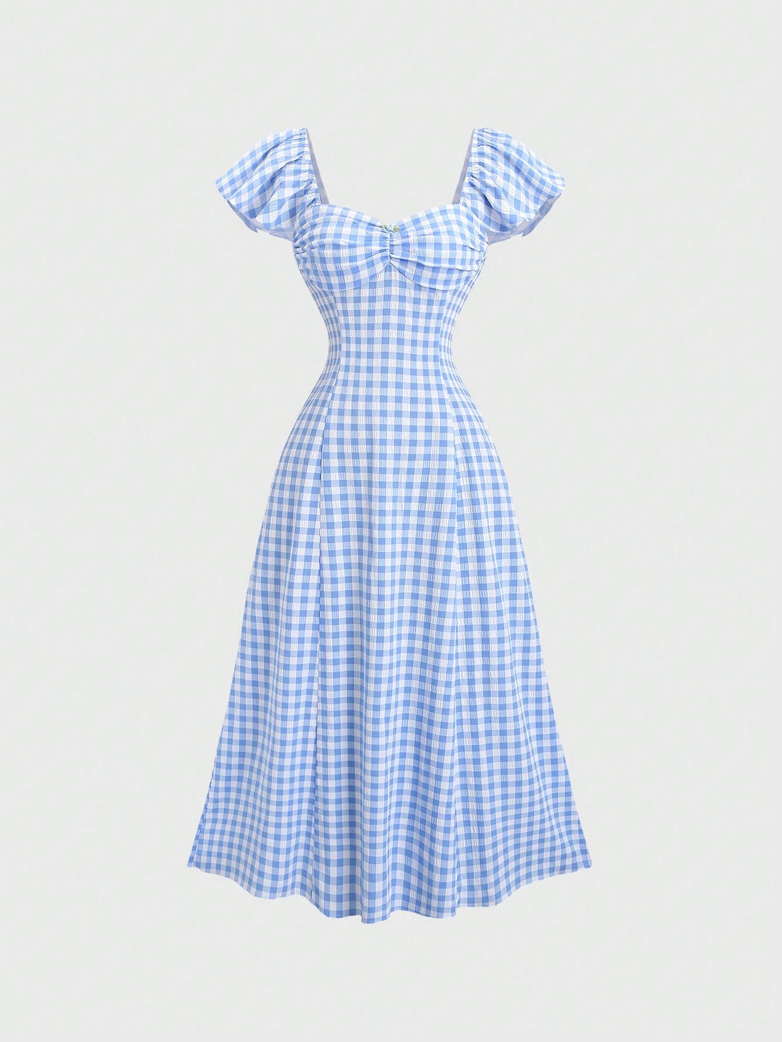 Step into summer with this playful plaid dress designed for effortless style. Lightweight and breezy, it keeps you cool while turning heads with its vibrant pattern. Perfect for sunny days or casual outings, this dress combines comfort and chic in one easy look. Embrace the season with a splash of fun and flair!