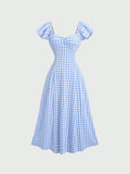 Step into summer with this playful plaid dress designed for effortless style. Lightweight and breezy, it keeps you cool while turning heads with its vibrant pattern. Perfect for sunny days or casual outings, this dress combines comfort and chic in one easy look. Embrace the season with a splash of fun and flair!