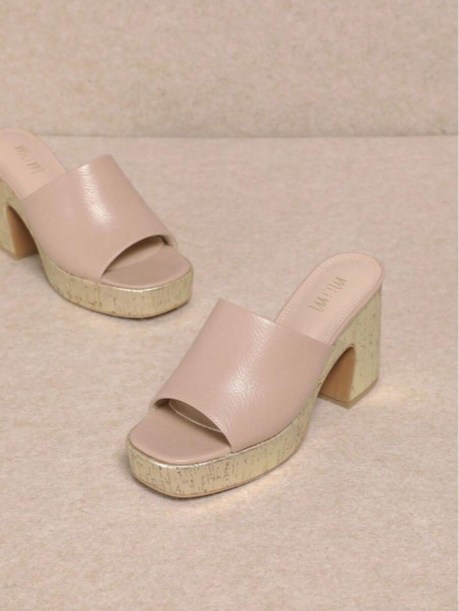 Step into summer with these playful platform chunky heel slip-on sandals designed for stylish comfort. Their bold, elevated sole adds a fun pop to any outfit while providing all-day support. Perfect for beach days or city strolls, these sandals make it easy to stay cool and look fabulous without sacrificing comfort. Ready, set, summer!