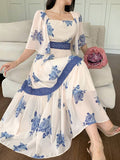 Step into sunny days with the Summer Elegance Colorblock Lace Floral Midi Dress. This playful dress combines delicate lace and vibrant floral prints to brighten your wardrobe while keeping cool. Its flattering midi length adds a touch of charm, perfect for brunches, garden parties, or carefree strolls. Light, breezy, and effortlessly chic—this dress invites you to celebrate summer in style.