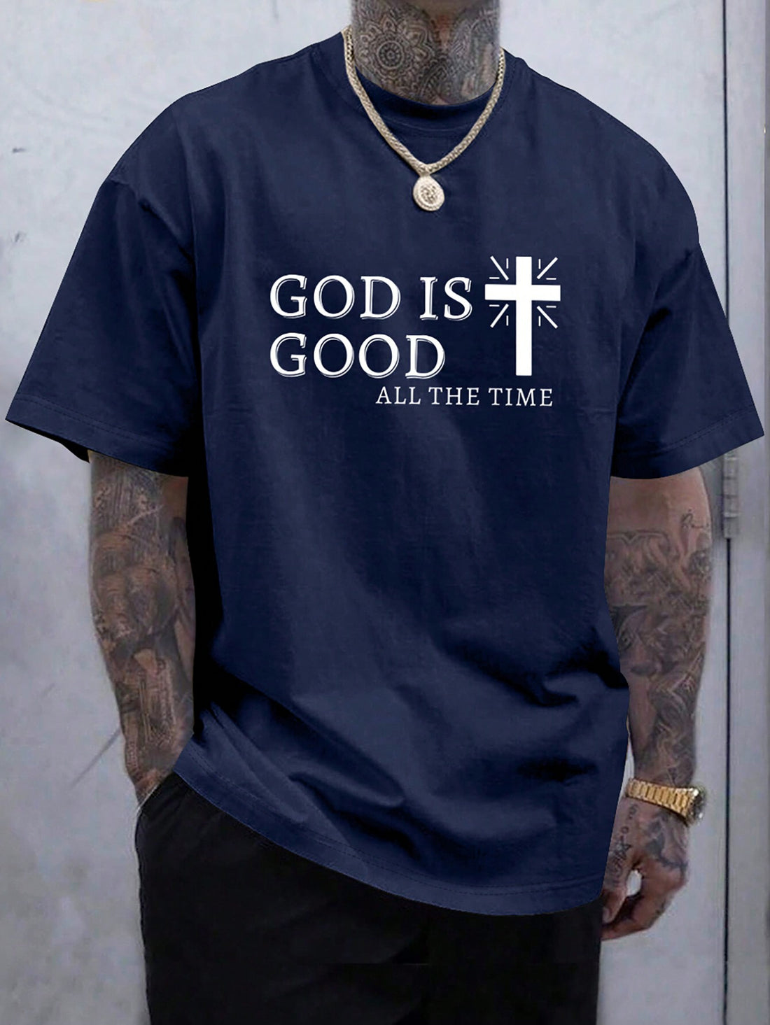 Stay cool and stylish this summer with our men's casual cross slogan print t-shirt. Made for comfort and style, this essential piece will keep you looking and feeling great. The cross slogan print adds a modern touch to any outfit. Perfect for any casual occasion, this t-shirt is a must-have for your summer wardrobe.