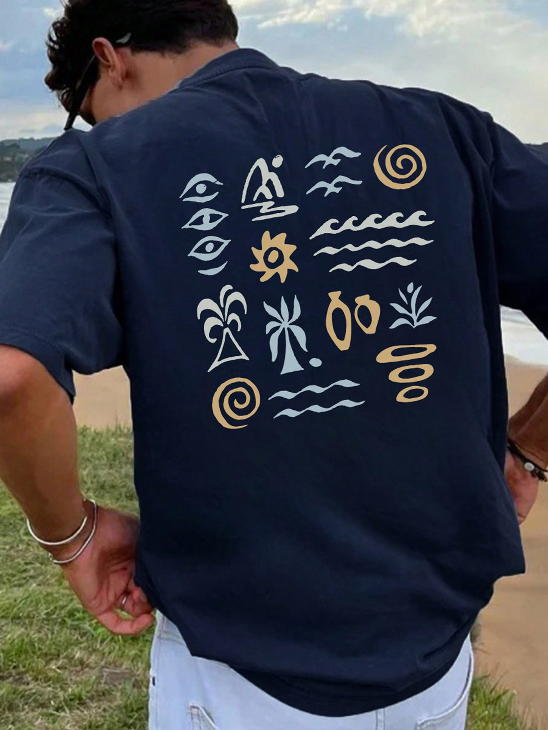 This Summer Eye Print Round Neck T-Shirt brings a casual style for men, featuring a unique summer eye print design. Made with quality materials, this shirt offers comfort and versatility for any occasion. Show off your fashion sense with this truly eye-catching shirt.