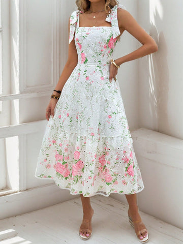 Introducing our Summer Floral Charm dress, featuring a delicate hollow embroidered square neck and a ruffle hem. Made for the warm season, this dress adds a touch of elegance and femininity to any outfit. It's perfect for a summer day out or a special event. Discover the charm of summer with this beautiful dress.