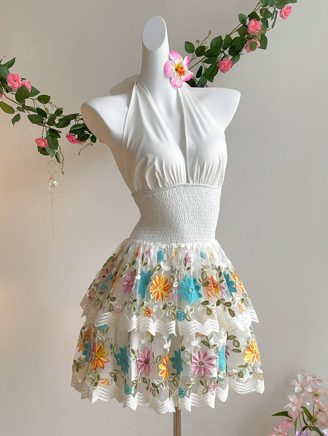 Embrace sunny days with this playful French-inspired dress featuring a flattering V-neck and sleeveless design. The cinched waist adds a touch of romance while keeping your silhouette effortlessly chic. Perfect for twirling through summer adventures or casual brunches, this dress combines comfort and style with a breezy, feminine flair.