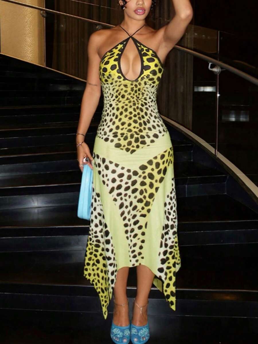 Front view of yellow leopard print halter maxi bodycon dress with crossover neckline and keyhole