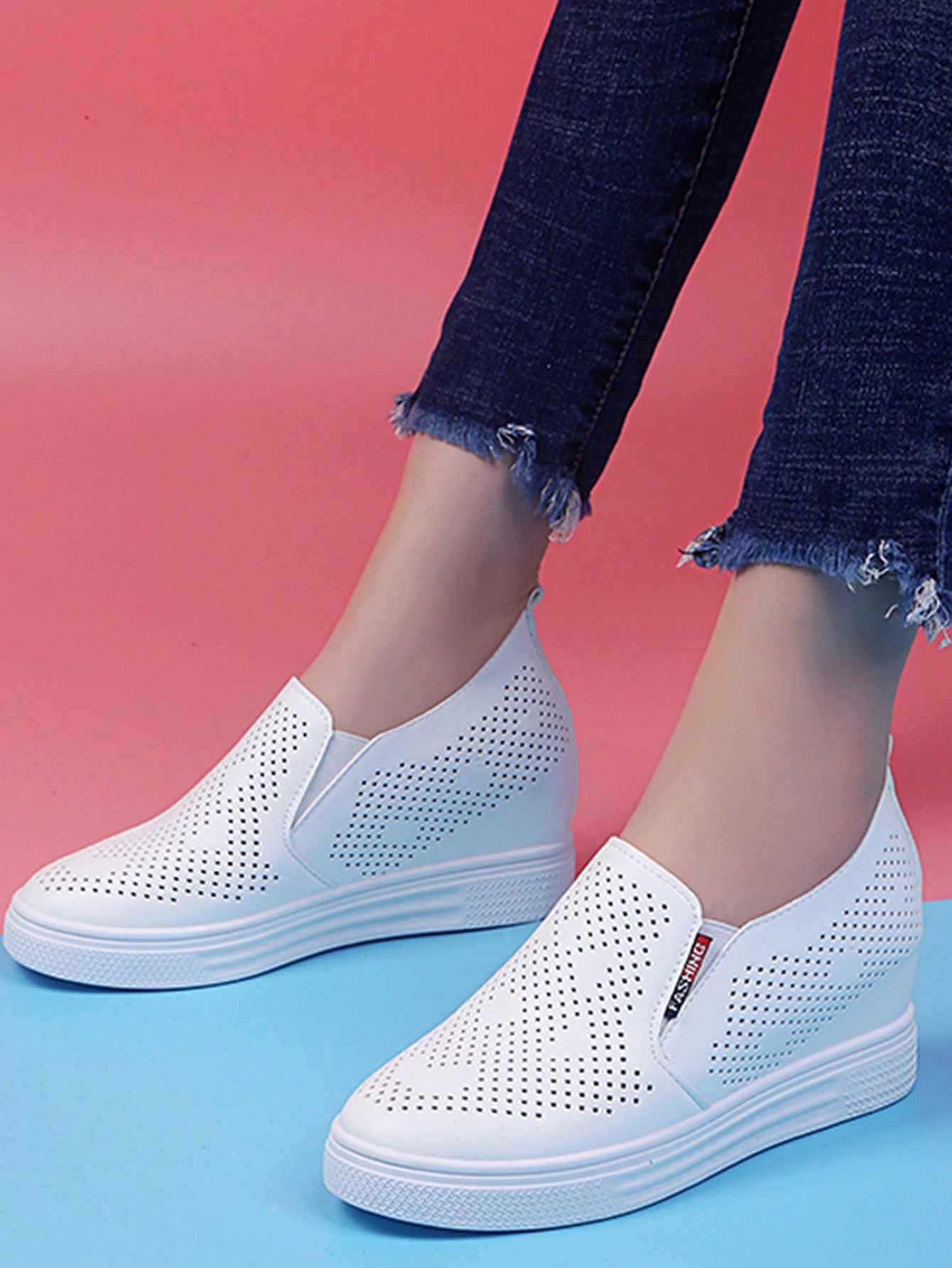 Elevate your style with these Summer Lightweight Breathable Hollow Platform Wedge Sneakers for Women! The airy design keeps your feet feeling fresh on hot days, while the platform wedge adds a fun twist to your outfit. Perfect for the quirky fashionista looking for a playful touch to their wardrobe.