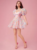 Indulge in a Summer Romance with this playful dress! The sweetheart neckline and bubble sleeves add sweet charm while the tie-dye print adds a touch of whimsy. Perfect for sunny days and fun nights with its lightweight fabric and flattering fit. Time to make some sweet memories!
