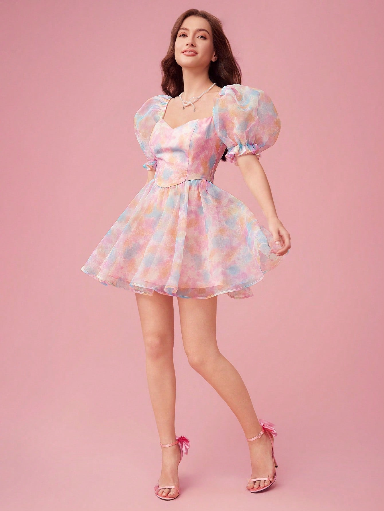 Indulge in a Summer Romance with this playful dress! The sweetheart neckline and bubble sleeves add sweet charm while the tie-dye print adds a touch of whimsy. Perfect for sunny days and fun nights with its lightweight fabric and flattering fit. Time to make some sweet memories!
