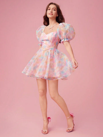 Indulge in a Summer Romance with this playful dress! The sweetheart neckline and bubble sleeves add sweet charm while the tie-dye print adds a touch of whimsy. Perfect for sunny days and fun nights with its lightweight fabric and flattering fit. Time to make some sweet memories!