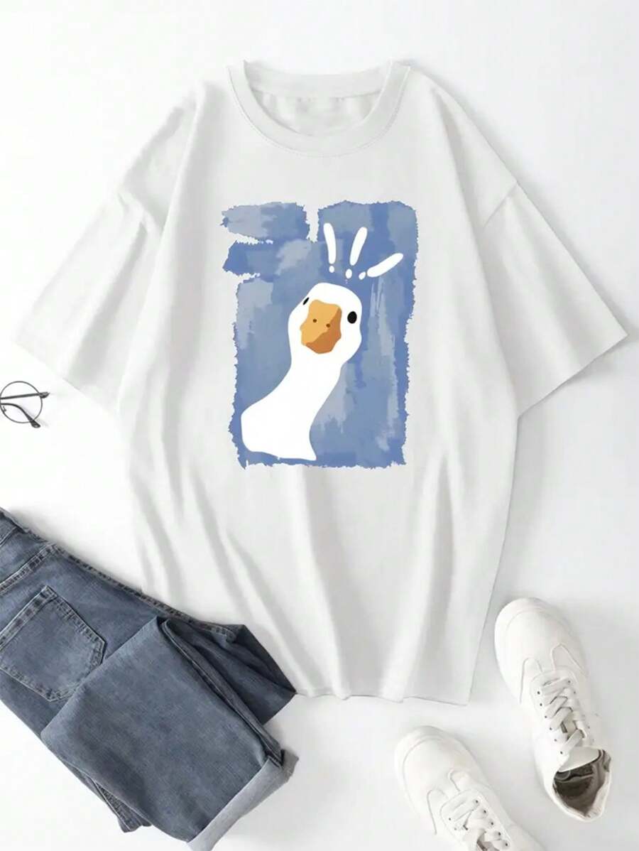 Front flat view of white oversized cartoon duck graphic tee with blue painterly block print