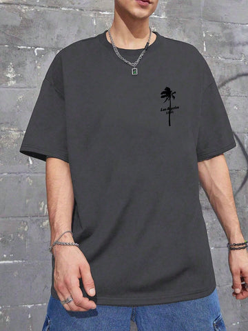 Experience the ultimate summer vibes with this stylish men's t-shirt. Featuring a playful palm tree print, this casual crew neck shirt will keep you cool and comfortable all season long. Embrace the laid-back vibes and add some fun to your wardrobe.