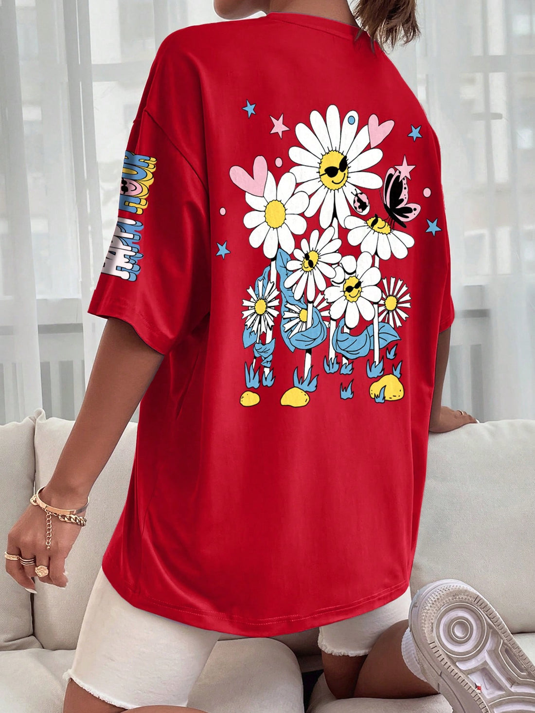Get ready for some summer fun with our Sunflower Bliss t-shirt! Made for women, this loose and casual round neck shirt will keep you cool and stylish all season long. With its playful sunflower design, this shirt is a must-have for any summer wardrobe. Don't miss out, grab one now!
