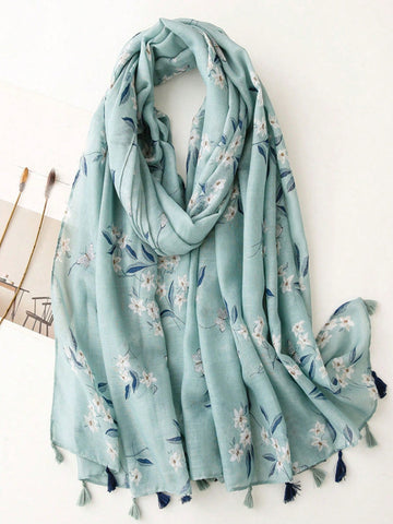 Introducing the Sunny Bohemian Charm scarf - a lightweight and stylish accessory for women on the go. Perfect for sunny days, it provides sun protection and can be worn as a scarf or cover-up during travel. Stay chic and protected with this versatile tassel scarf.