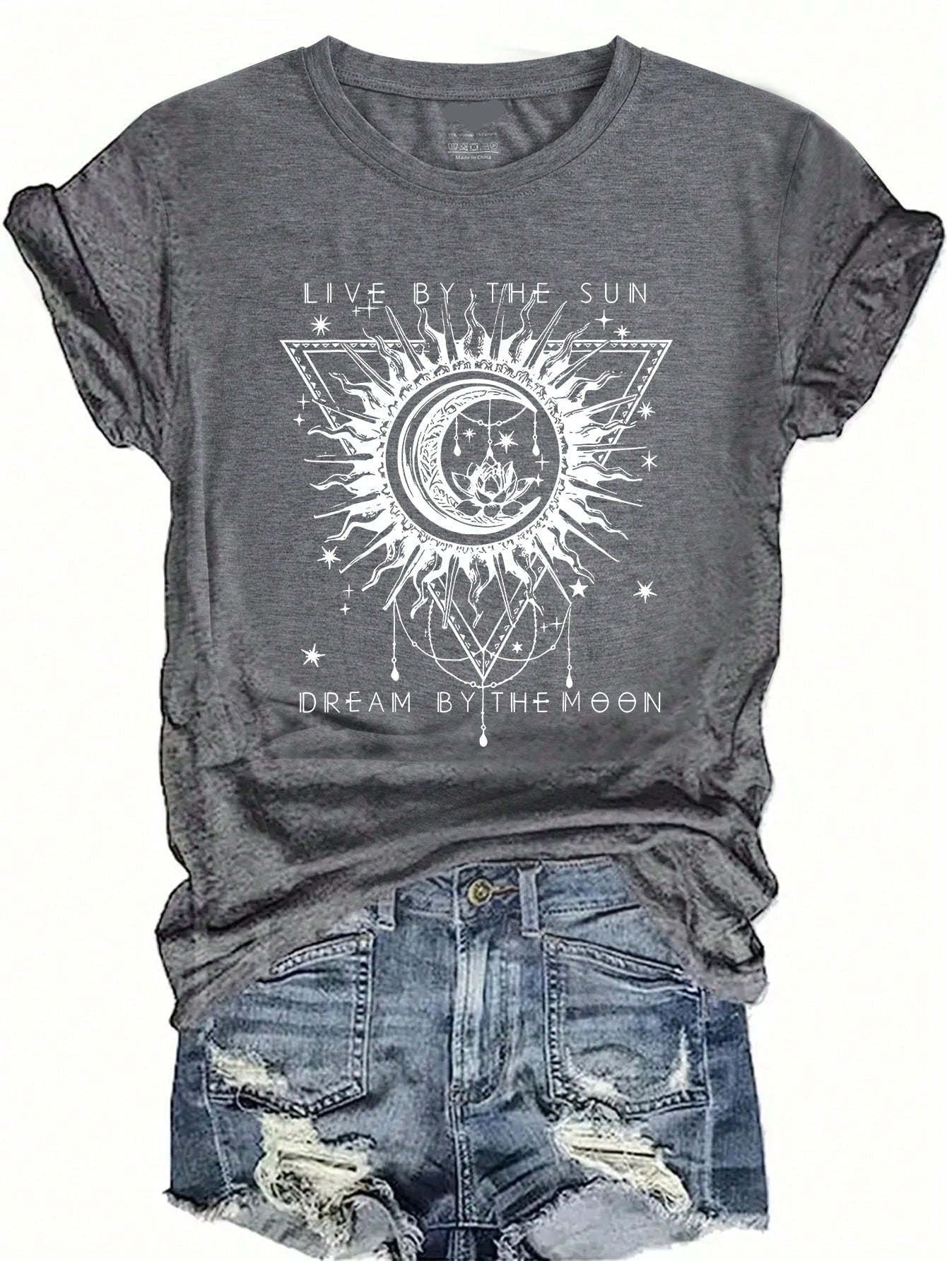 Live by the sun and dream by the moon with our Sunny Dreams Graphic Tee. Embrace your free-spirited and carefree side while looking stylish and comfortable. Perfect for any casual occasion, this tee will be your new favorite go-to.