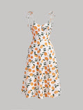 This cami dress is the perfect addition to your wardrobe, featuring a sunny lemon print and fun tie shoulder details. Brighten up any outfit with this quirky and playful piece. (Playful and quirky, this dress is sure to add some zest to your style! 🍋)
