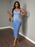 Introducing the Sunset Dreams strapless gradient denim dress for women. Made with high-quality denim, this dress features a unique gradient design that adds a touch of elegance to your outfit. The strapless style allows for a comfortable and flattering fit, perfect for any occasion. Upgrade your wardrobe with this must-have dress.