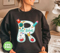 This customizable, personalized teacher design features a custom teacher name with the letter 