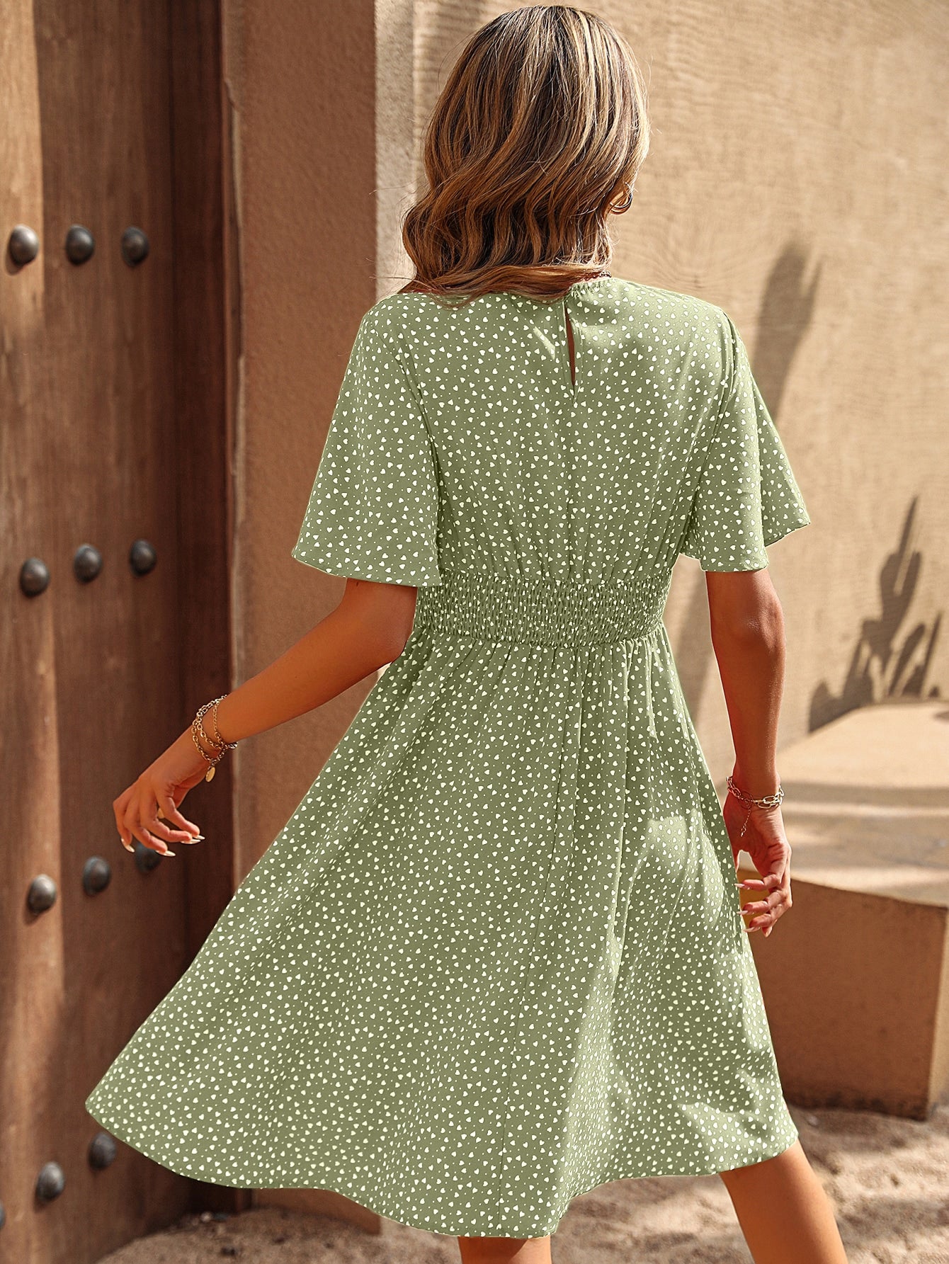 Effortlessly escape to a beachy paradise in our Sweetheart Escape dress! Featuring a charming allover heart print and fluttery butterfly sleeves, this dress will have you feeling effortlessly stylish and ready to soak up some sun. Perfect for a playful and carefree look.