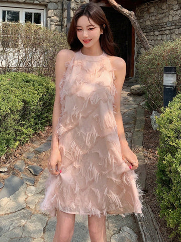 Be sweet and stylish this Valentine's Day with our Sweetheart Fuzzy Trim Halter Dress! The perfect outfit for date night or a night out with friends, its halter design and fuzzy trim add a touch of playfulness. Stand out and spread the love with this eye-catching dress!