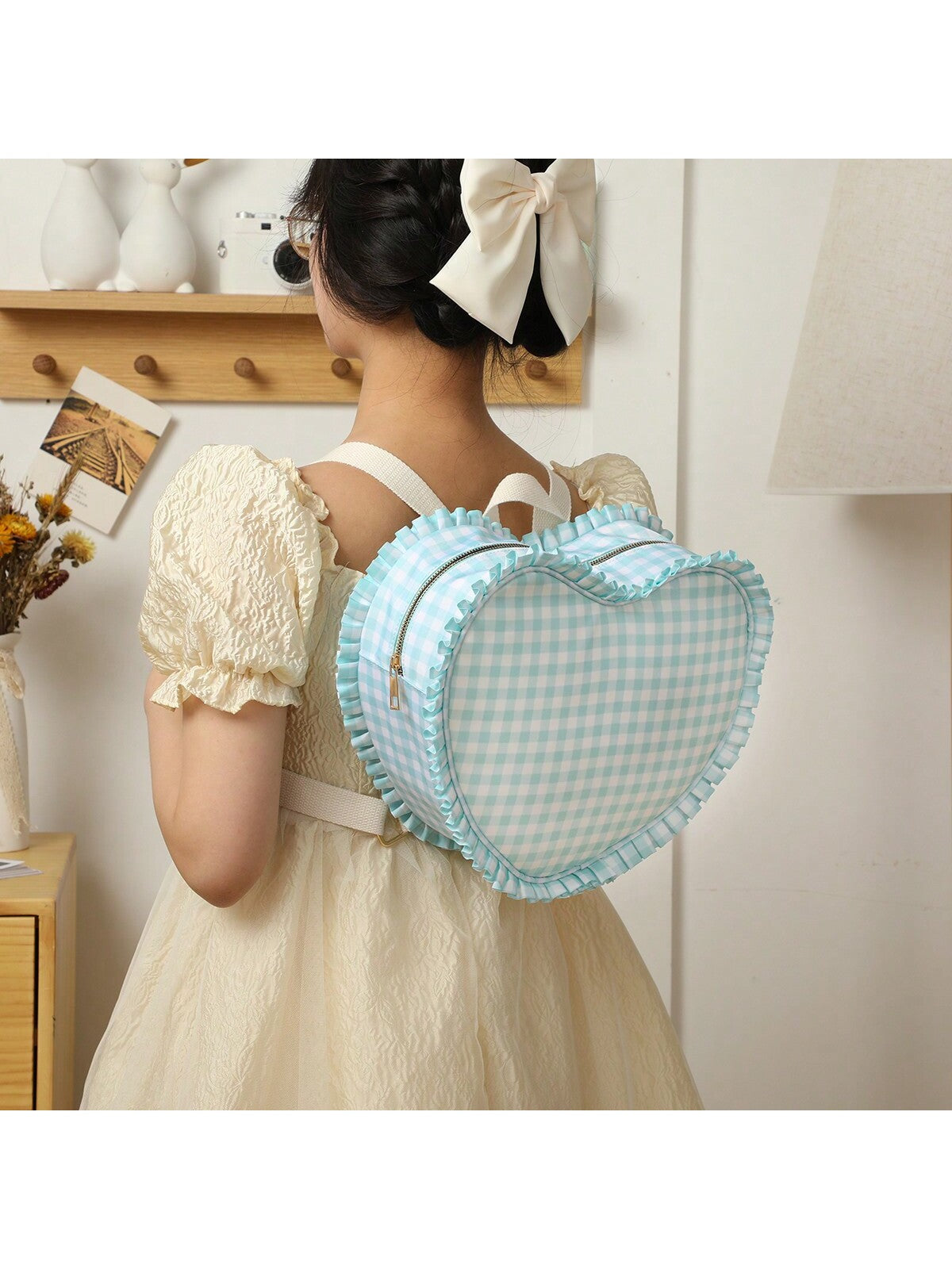 Introducing Sweetheart Ruffles, the stylish backpack purse for women on-the-go. This innovative and fashionable bag combines functionality and fashion, making it the perfect accessory for any active woman. With its ruffle design and convenient backpack straps, this bag is both stylish and practical. Stay organized and look great with Sweetheart Ruffles.