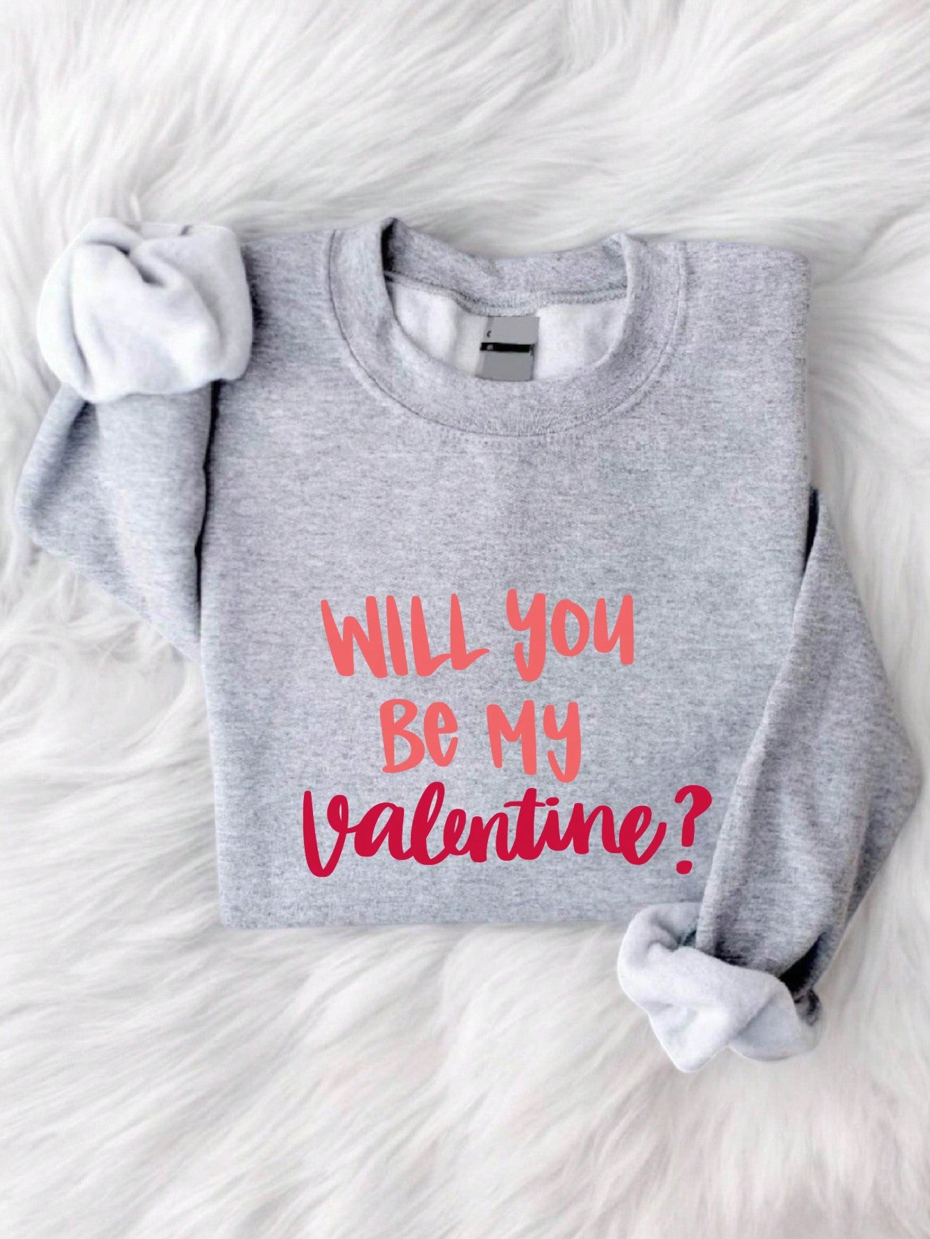 Feel effortlessly charming this Valentine's Day with our Sweetheart Style sweatshirt! Cozy up in this cute slogan print sweatshirt that will add a touch of quirk and fun to your outfit. Perfect for a casual date night or just lounging at home, this sweatshirt is a must-have for the holiday of love. (Pair with your favorite jeans for ultimate cuteness!)