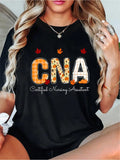 Show off your thankfulness with this quirky and playful t-shirt for certified nursing assistants! The fall leaves design adds a touch of seasonal charm, making it the perfect addition to your Thanksgiving wardrobe. Get ready to spread some joy and appreciation in this unique and fun t-shirt!