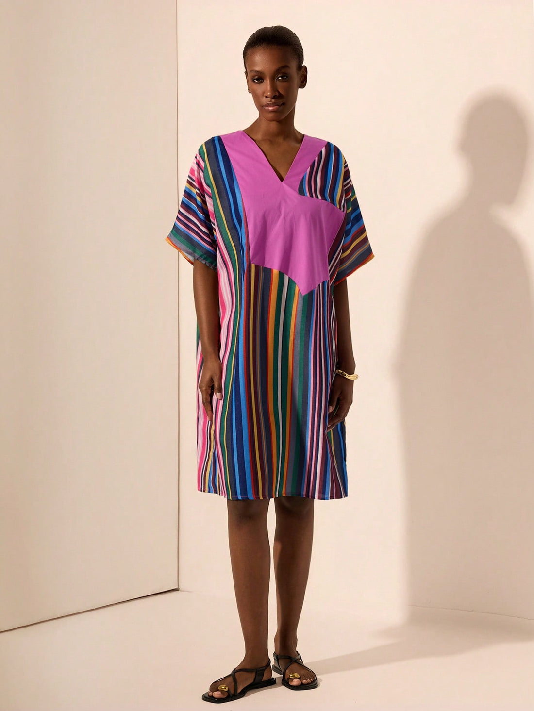 Step into summer with the Contemporary Boho Mini, featuring an oversized V-neck and bold striped colorblock design. Its wide sleeves add a breezy, playful vibe perfect for sunny days and spontaneous adventures. This unique piece blends comfort and style effortlessly, making it your go-to for standout summer fashion.