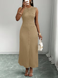 Slip into summer ease with the Easy-Wear Black Maxi! This sleeveless dress features a textured knit that feels as good as it looks. The playful flap detail and shiny metal buckle add a dash of charm, making it perfect for sunny days and breezy nights. Stay cool, comfy, and effortlessly stylish all season long!
