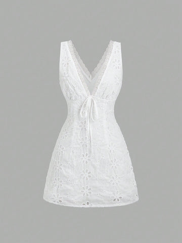 Step into charm with the Graceful Embroidered Mini Dress! Featuring a flirty V-neck, delicate lace trim, and slender spaghetti straps, this dress effortlessly blends sweet and sassy. Perfect for twirling through sunny days or dancing into the night, it’s your go-to for a playful yet elegant look that turns heads wherever you go.