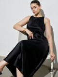 Slip into the Luxe Drape Slimming Dress and let its silky double-sided satin-like acetate flow with every step. This sleeveless beauty features a chic diagonal cut that flatters your silhouette while adding a playful twist to your look. Perfect for dancing the night away or turning heads at any event, it moves as effortlessly as you do. Embrace elegance with a dash of fun!