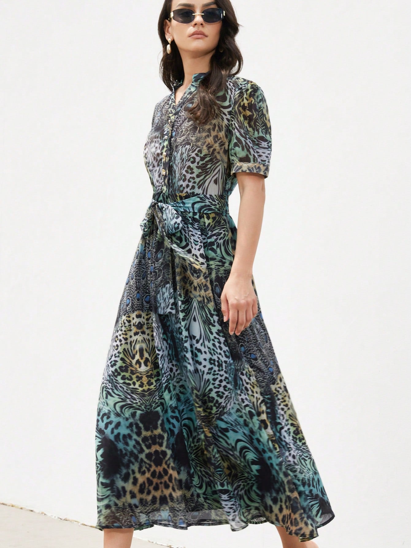 Turn heads this summer with the Statement Leopard Dress! Featuring a chic stand collar, playful bubble sleeves, and a flirty A-line flared hem, this dress brings bold confidence to your wardrobe. Perfect for sunny days and stylish nights, it’s your go-to piece for effortless, fun fashion. Embrace your wild side and make every moment a statement!