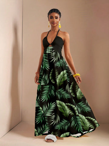 Get ready to turn heads with the Tropical Escape Maxi! Featuring a playful drawstring halter and a breezy backless design, this dress is perfect for sunny days and warm nights. The vibrant leaf print adds a splash of tropical fun, making it your go-to for summer getaways. Light, comfortable, and effortlessly stylish—your vacation wardrobe just found its new favorite.
