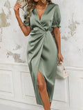 Elevate your wardrobe with our Timeless Elegance V-Neck Dress. The mint green color adds a fresh, feminine touch, while puff sleeves add a trendy flair. Perfect for any occasion, this dress exudes elegance and sophistication.
