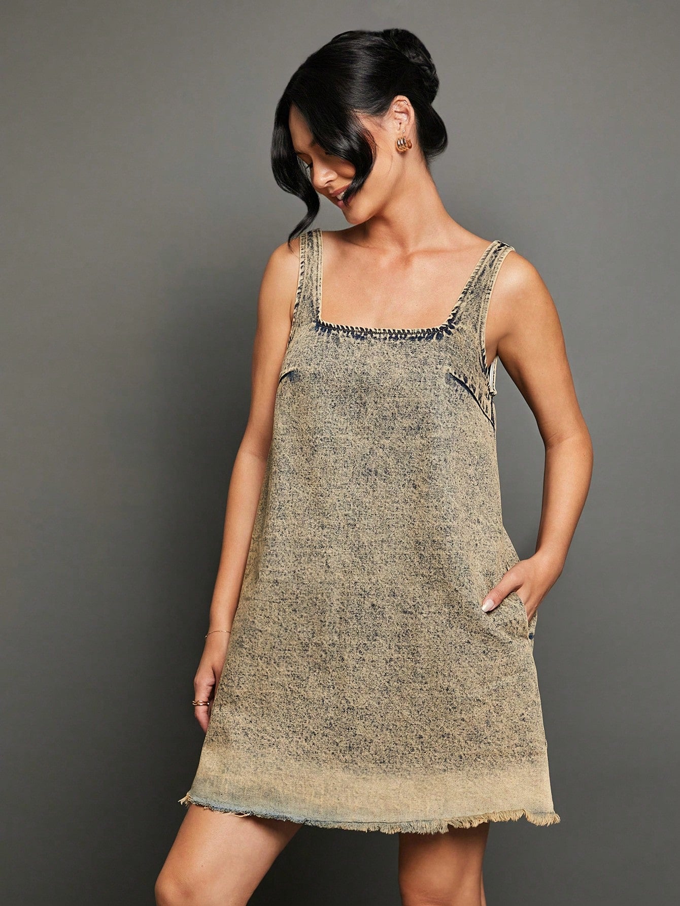 Elevate your style with our Trendy Acid Wash Mini Dress. Made from premium cotton denim, this dress offers effortless style with its trendy acid wash design. Crafted with comfort in mind, it's perfect for any occasion. Upgrade your wardrobe with this must-have piece.