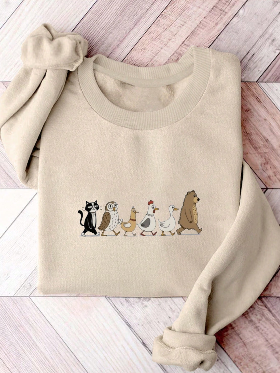 Unleash your wild side with our Trendy Animal Print Crew Neck Sweatshirt! Perfect for adding a touch of excitement to your everyday casual style. Stay effortlessly cool and comfortable with this must-have piece.