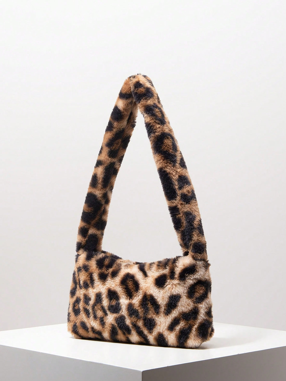 Upgrade your travel game with our Trendy Autumn Y2K Candy Color Fluffy Satchel Bag! Designed for the chic woman, this bag features a trendy leopard print and a candy color fluffy material. It's perfect for all your travel essentials and will add a touch of style to your outfit. Get yours today!