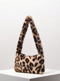 Upgrade your travel game with our Trendy Autumn Y2K Candy Color Fluffy Satchel Bag! Designed for the chic woman, this bag features a trendy leopard print and a candy color fluffy material. It's perfect for all your travel essentials and will add a touch of style to your outfit. Get yours today!