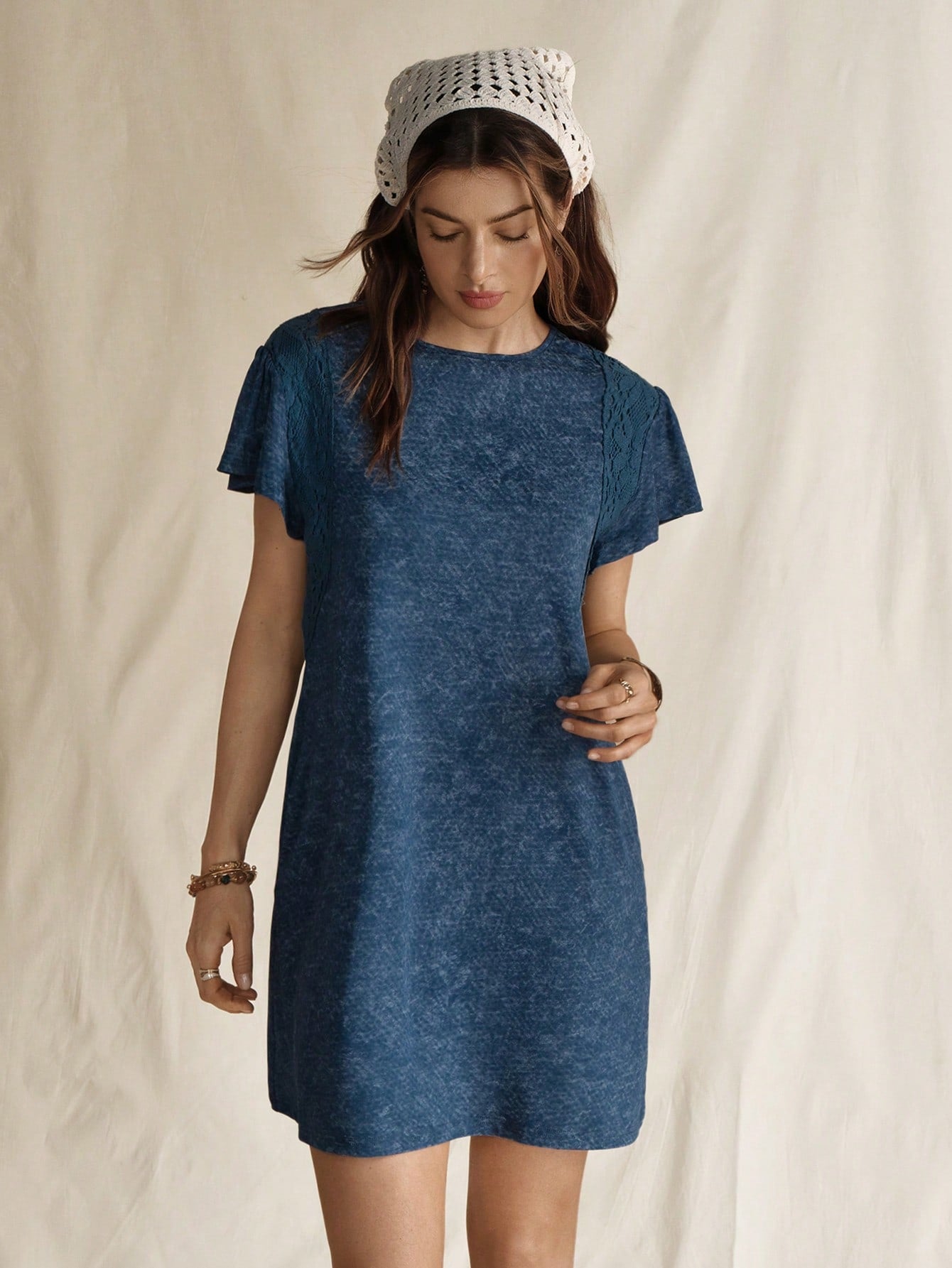 Step into summer with this playful blue cowgirl crop mini dress, designed to keep you cool and stylish. Its vibrant hue and flirty cut make it the perfect choice for sunny days and lively nights. Whether you're heading to a festival or a casual outing, this dress adds a fun, fresh twist to your wardrobe. Embrace your inner cowgirl and turn heads wherever you go!